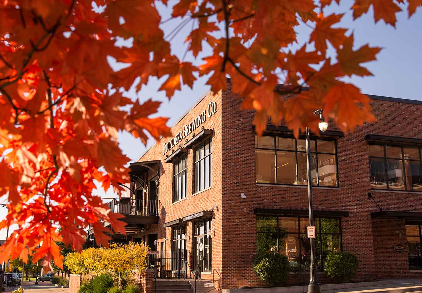 Founders building through fall foliage