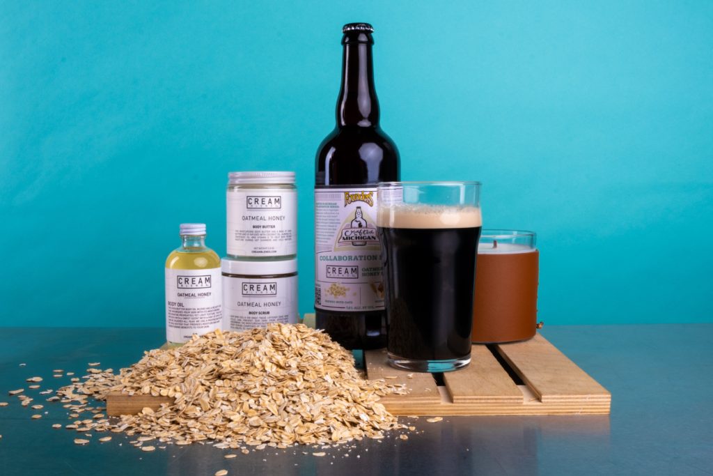 CREAM BLENDS Oatmeal Honey Stout On Display With Oats and Full Pour